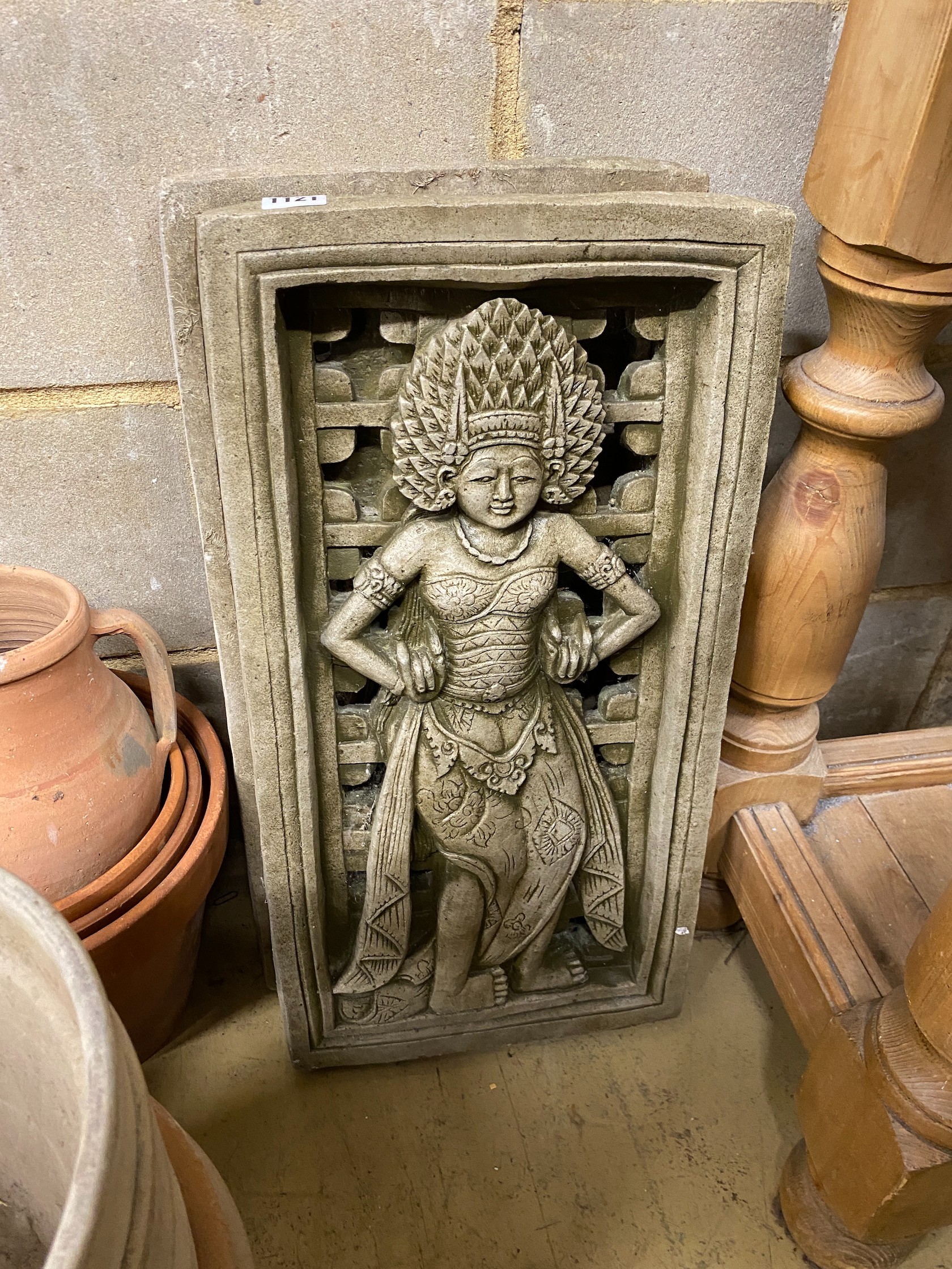 A pair of rectangular reconstituted stone Eastern style garden wall plaques, width 31cm, height 61cm